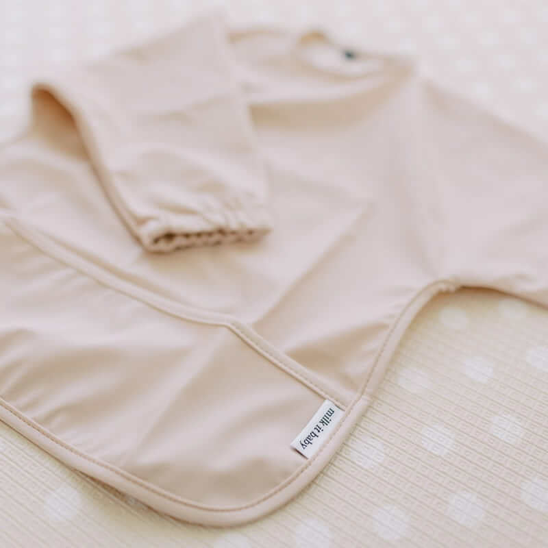 Milk It Baby Sleeved Bib - Coral Pink
