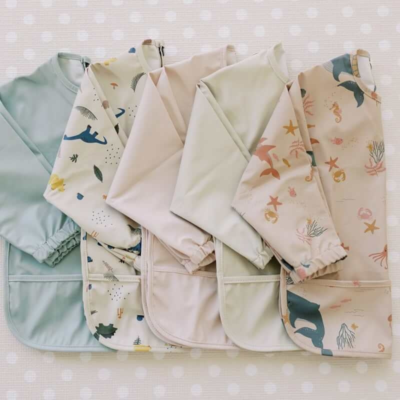 Milk It Baby Sleeved Bib - Coral Pink