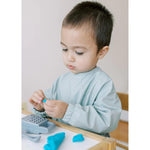 Milk It Baby Sleeved Bib - Seaform Green