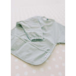 Milk It Baby Sleeved Bib - Seaform Green